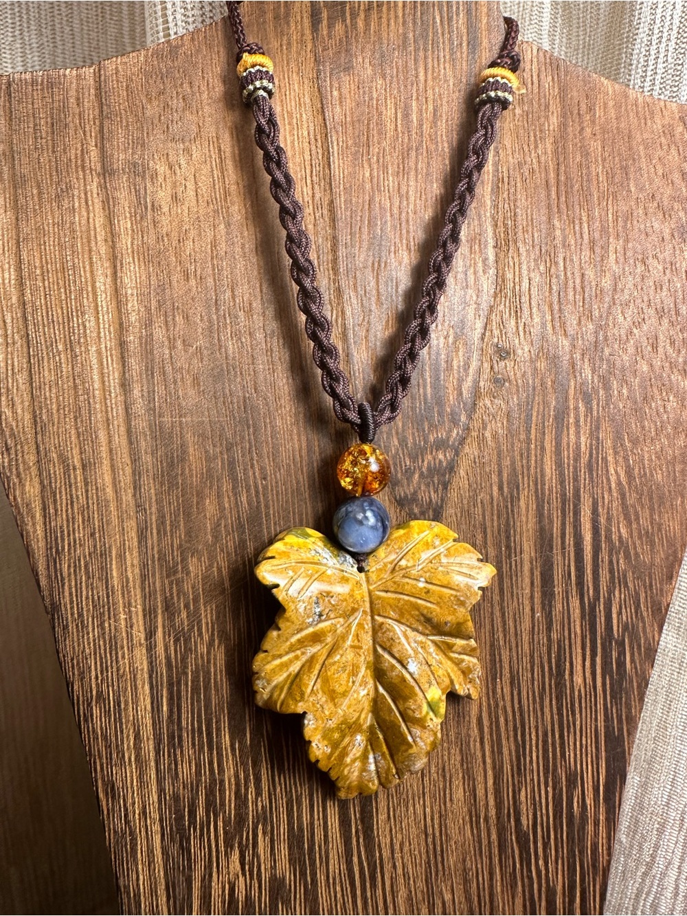 Yellow Ocean Jasper Leaf Carving Pendant Necklace on Brown Braided Rope - Picture 9 of 13